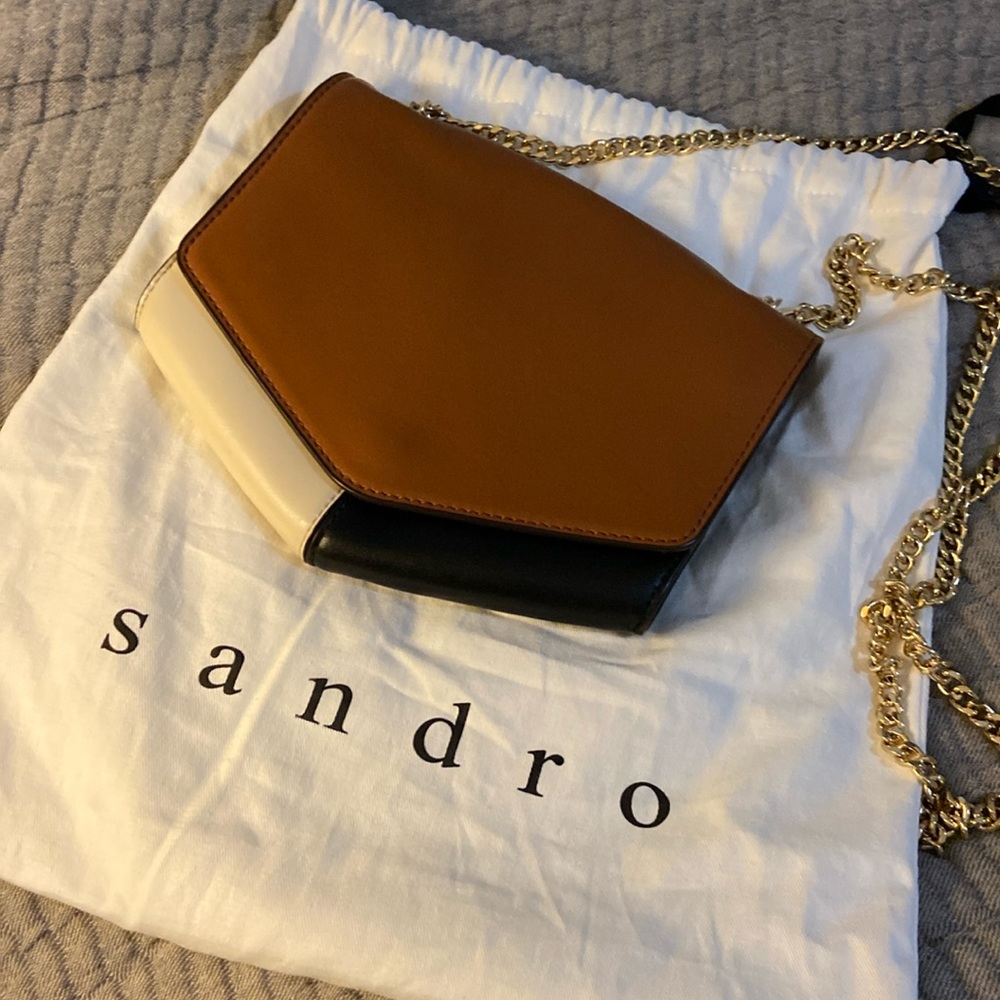 Sandro Lou color-block clutch with chain